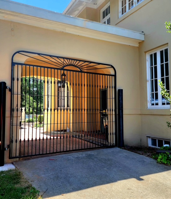Sunburst estate gate · installed