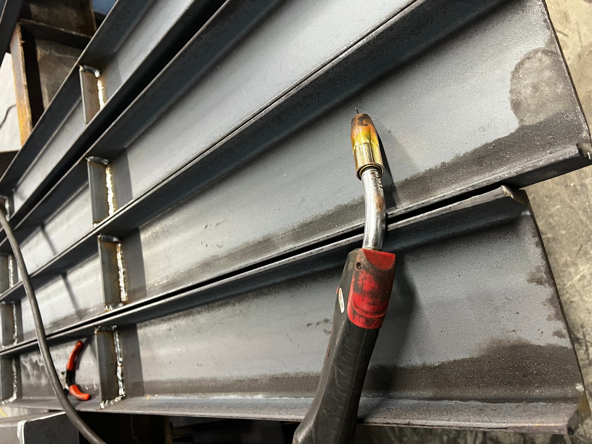 Welding stair stringers · the shop floor